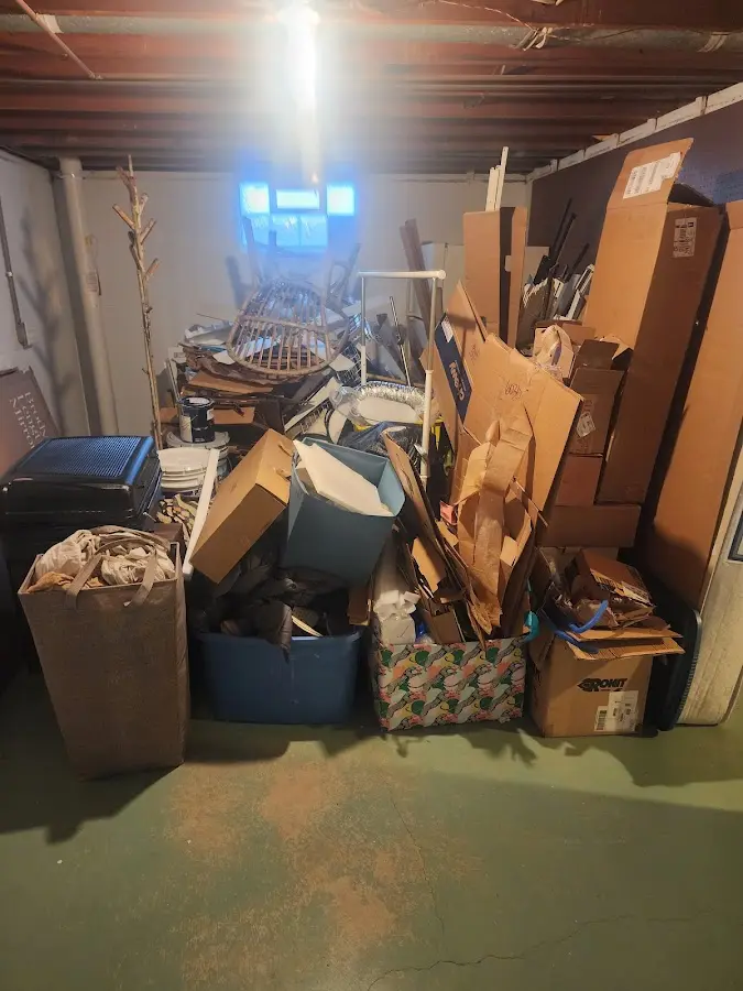 Roll-off dumpster container at job site for 2 Yard Dumpster Rental in Pike Road